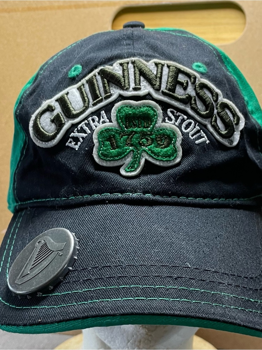 Guinness Black and Green Embroidered Logo Cap with Built in Bottle Opener.